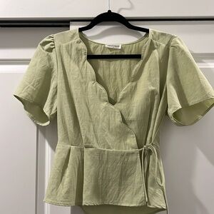 Vestique green scalloped top